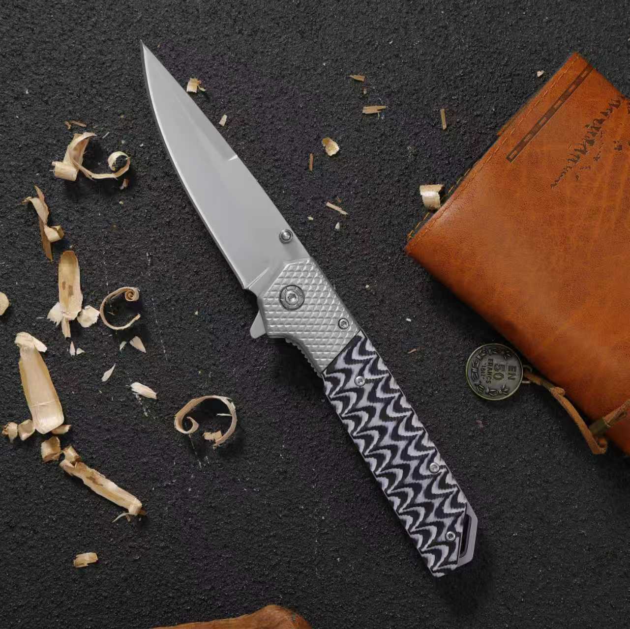 F220 folding knife with wood color stainless steel handle